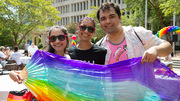 Brunch: Celebrating at the brunch, UTSW students Siddhakshi Solanki (left) and Chetana Jaddhav hold a festive banner with UTSW research assistant Kyle Feola.