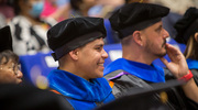 Abner Josue Gonzalez Castro, Ph.D., is all smiles after receiving his diploma.