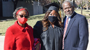 Master of Physician Assistant Studies graduate Stephanie Powdar (center) with her parents