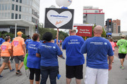Walkers from UTSW's Endoscopy team show off the backs of their shirts.