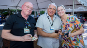Eric Williamson, Video Content Specialist; Kevin Mitchell, Television Producer/Editor for IR Strategy & Engagement; and Christy Garner, Director of Institutional Events and Venues, relish great food and camaraderie.