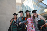 UTSW Medical School students in lobby following commencement