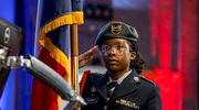 Cadet Staff Sgt. Rylee Tucker, a member of Dr. John D. Horn High School’s Junior Reserve Officers’ Training Corps (JROTC) Big Red Color Guard/Drill team, saluted the American flag at UT Southwestern’s Tribute to Veterans Celebration. The Nov. 11 campus event included a presentation of colors by the JROTC, then a keynote speech from Tony Lakin, M.S.I.T., Vice President and Chief Information Security Officer at UTSW. Mr. Lakin talked about the impact of his U.S. Air Force service.