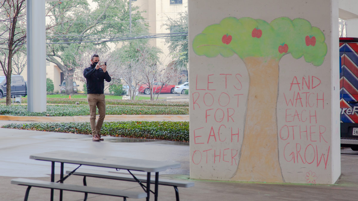 Chalk art drawing of a tree on a pillar