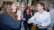 Surrounded by his mom and dad, Jeremy Aymard celebrates with his wife, Maddie Aymard, after opening his Match Day envelope. On Friday, March 17, over 200 fourth-year medical students took part in Match Day 2023, an event filled with laughter, happy tears, and joy as students discovered where they would be spending the next chapter of their medical training.