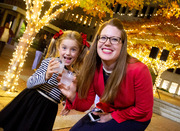 Dr. Jaclyn Albin and her daughter, Junia Albin, share a “cheers” at the reception.