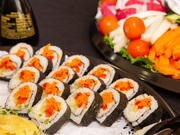Sushi and fresh vegetables were available at a reception after the program.