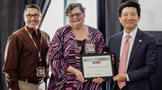 One of two Platinum pin recipients for Academic Affairs – Kimberly Ann Hawkins – pictured with Institutional Review Board Manager Erik Soliz and W. P. Andrew Lee, M.D., Executive Vice President for Academic Affairs, Provost, and Dean of UTSW Medical School.