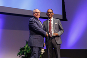 Dr. Podolsky greets Dr. Gebreyohanns, winner of The President’s Award for Diversity and Humanism in Clinical Care.