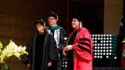 From left: Presenting diplomas were UT Regent Christina Melton Crain, UTSW Associate Dean for Student Affairs Blake Barker, M.D., and Dr. Podolsky.