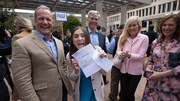 Madeline Sparks (center), surrounded by her family, celebrates her match to UTSW.