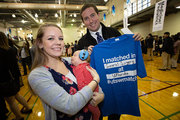 Medical student Evan Barrios, who will travel to the University of Florida College of Medicine for his General Surgery residency at Shands Hospital, and his wife, Megan, brought along some handy ear protection for 2-month-old son Henry in the celebratory din of the Williams Center gymnasium.