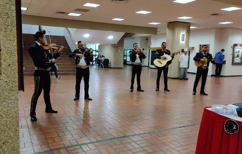 The crowd was entertained by performances from a mariachi band.