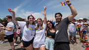 Parade: UTSW students (from left) getting into the spirit of the parade are Nicole Familiari, Weronika Stachera, Amy Whitaker, and Roy Garcia.