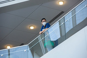 The performance garners attention from all directions inside the hospital.