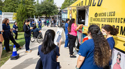 UTSW community members place their orders at Nacho Loco food truck, one of the five food trucks participating at the event.