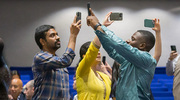 Families of graduates ensure they capture the momentous occasion.