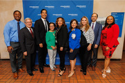 From left: Travis Gill, Assistant Vice President of Institutional Equity & Access; Ruben Esquivel, Vice President for Community and Corporate Relations; Dr. Gonzalez; Dr. Velez; Ms. Bell; BRG Development Committee Lead Diana Mendoza; BRG co-Chair Judith Ramos; Dr. Girod; and Dr. Nesbitt pose for a photo.