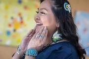 Ms. Piechowski-Begay, of the Navajo tribe, shows off her traditional silver and turquoise jewelry.