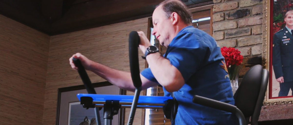Don Winspear working out on elliptical-type glider