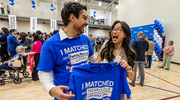 Sergio Gutierrez, left, and Nhi Pham can’t contain their excitement after matching.