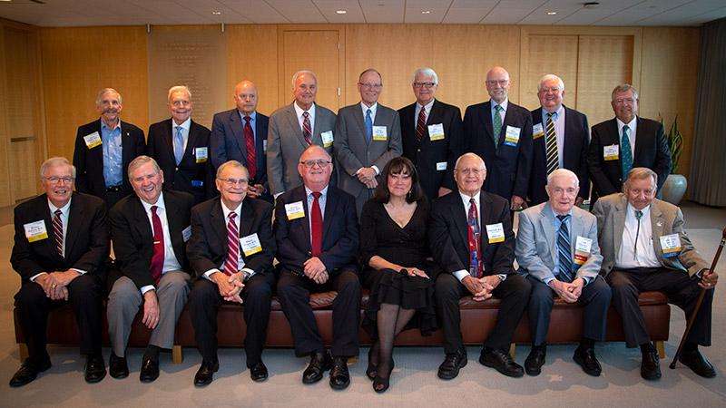 Two rows of people posing for a photo