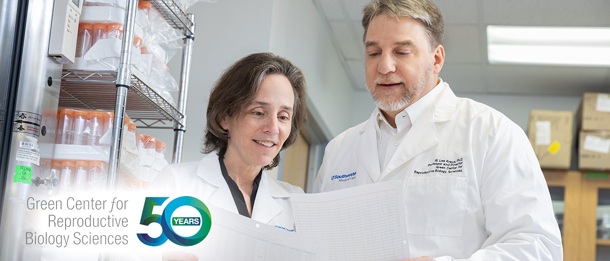 A woman and man wearing lab coats, standing in front of a metal shelving unit holding unused test tubes, studying papers in front of them. Logo - Green Center for Reproductive Biology Sciences, 50 Years