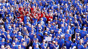 A sea of blue and red UTSW walkers gathers for a group photo before the walk.