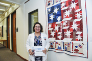 Amanda Evans, with Sunbonnet Sue’s Stars and Stripes (Textiles and Fiber, Amateur, first place)