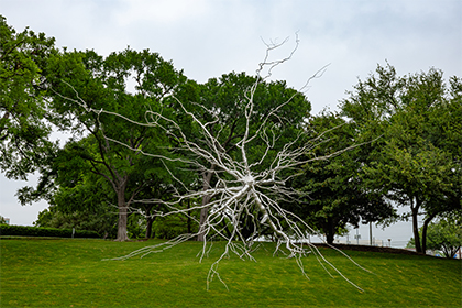 Statue of large silver neuron.