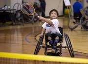 Youth participant plays badminton