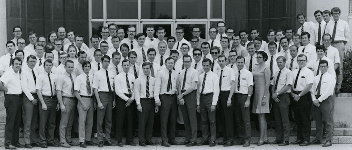 Large group of people in black and white photo