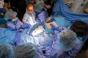Students learn about what it is like to be a surgeon in the operating room.