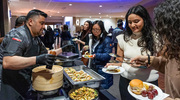 Attendees stopped by the bao bun station at the reception.