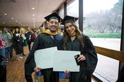 Posing for a shot with their diplomas are Physician Assistant Studies graduates Luis Arroyo and Alexandria Casanova Zepeda.