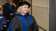 Amy Zwierzchowski-Zarate, M.S., Ph.D., leaves the ceremony with pride after earning her degree in neuroscience.