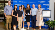 Ms. Smith shares the special evening with her family, from left: Austin Smith (brother), Emily Smith (sister-in-law), Gabe Smith (nephew), Evie Smith (niece), Rodney Smith (dad), and Dede Smith (mom).