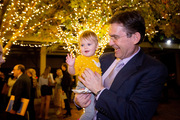 Dr. DuWayne Willett and his granddaughter, Eva Willett, enjoy the early evening reception outdoors on McDermott Plaza.