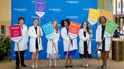 At the UT Southwestern Medical School Class of 2029 White Coat Ceremony on Oct. 4, medical students showed off banners that represent the six Academic Colleges: Cary, Estabrook, Fashena, Pritchard, Seldin, and Sprague.