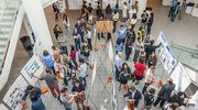 UT Southwestern postdoctoral researchers check out a sea of poster presentations and network during the institution’s annual Postdoctoral Research Symposium, which took place during National Postdoc Appreciation Week in late September.