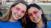 Two walkers sport their rose-colored heart glasses in preparation for the walk.