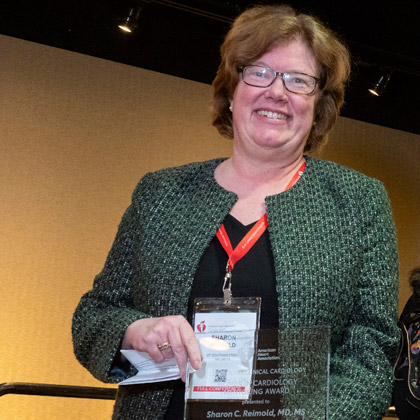 Woman holding an award