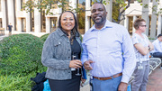 Shawna Nesbitt, M.D., and Russell Debose-Boyd, Ph.D., take a moment for a photo at the reception.