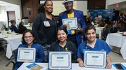 Health System PACT pin recipients pose for a photo.