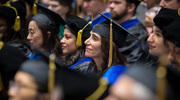 Denise Marciano, M.D., Ph.D., Associate Professor of Internal Medicine, watches the ceremony intently as remarks are made at the May 18 Graduate School of Biomedical Sciences commencement. Dr. Marciano holds the Carolyn R. Bacon Distinguished Professorship in Medical Science and Education.