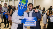 Mohammad Khan and Champ celebrate matching to UT Southwestern.
