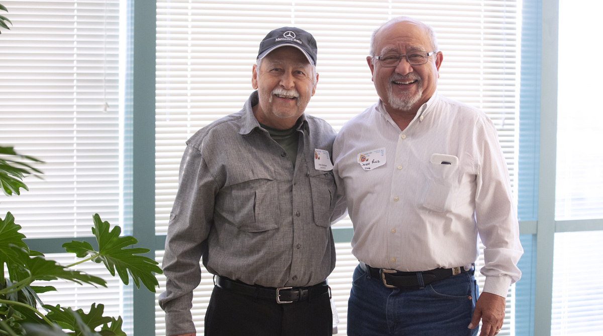 Lung transplant patients Jose Martinez, Sr. (left) and Jesse Ruiz shared some laughs together at the reunion.