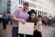 Graduate Victoria Oliver, master of clinical nutrition, celebrates with her family, Luke Oliver and baby Savannah.