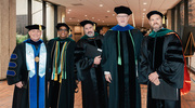 Health professions Department Chairs and Directors of the graduating programs take a moment for a celebratory photo.