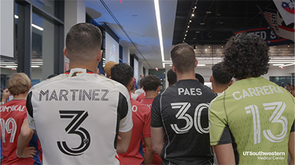 soccer team players in colorful jerseys